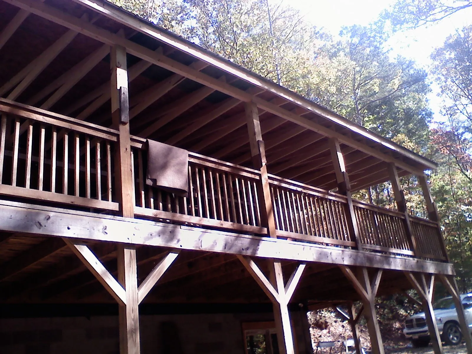 Timber framing under a new elevated porch and deck — Roof Leak Repair in Barksdale by Roofing Brothers